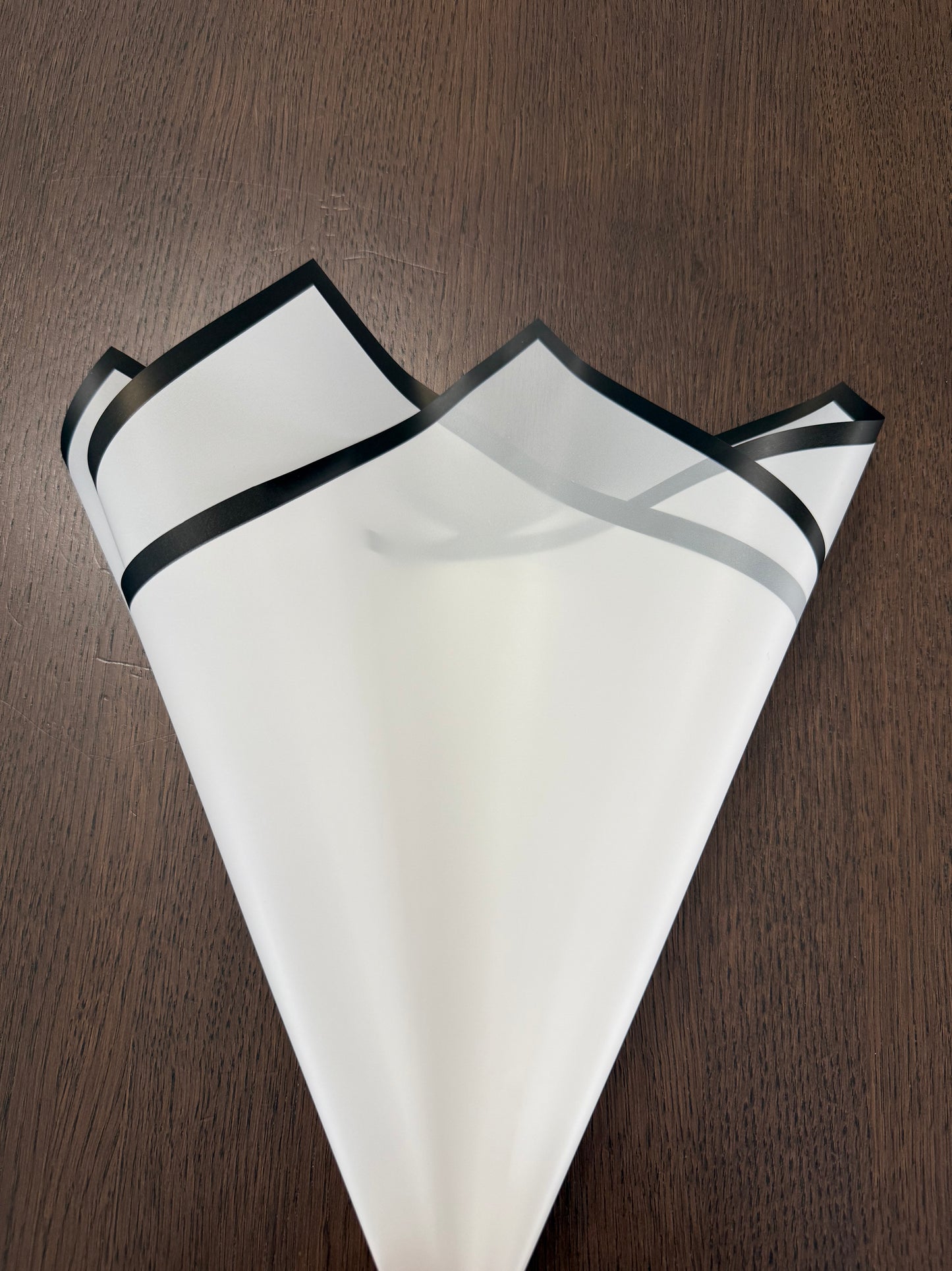 P.GDM-B- Semi Transparent White/Black Border Wrapping paper