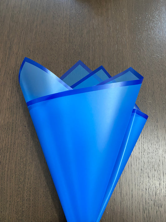 Sheer royal blue wrapping with blue border